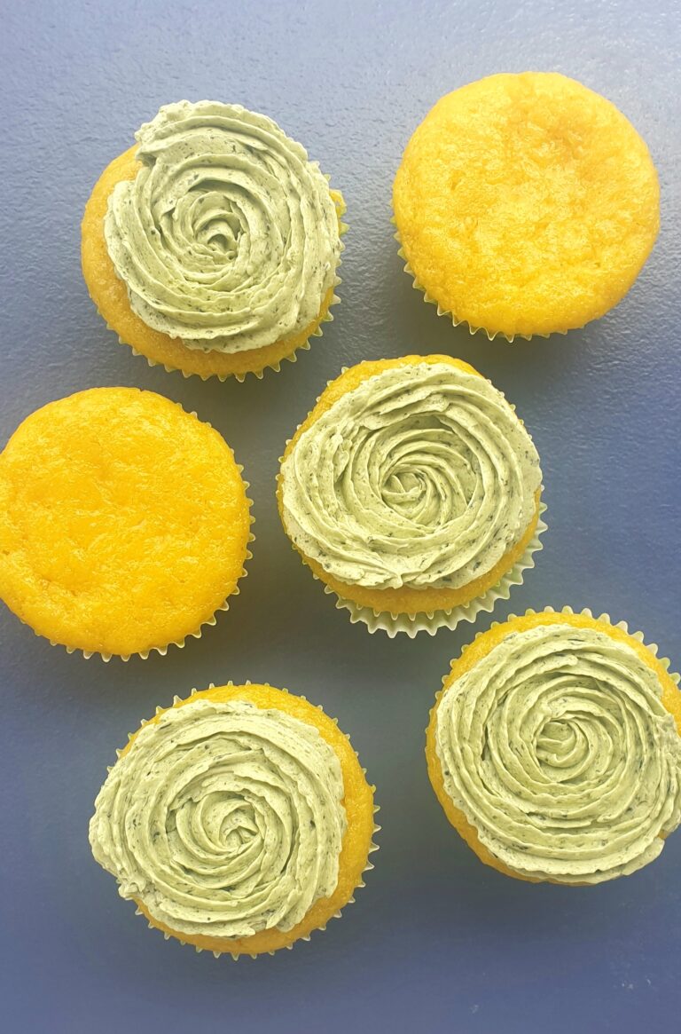 Eggless mango cupcakes with basil buttercream